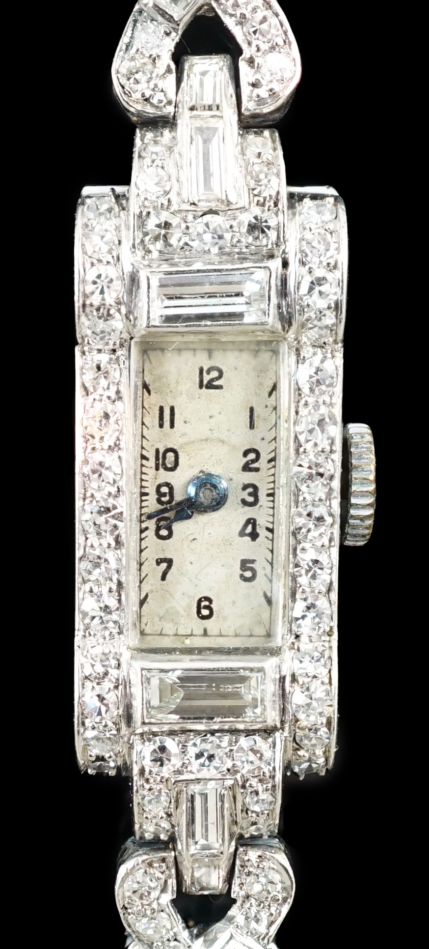 A lady's 1930's/1940's platinum, baguette and round cut diamond set rectangular dial manual wind cocktail watch, on a white gold and baguette and round cut diamond set bracelet, with Asprey box